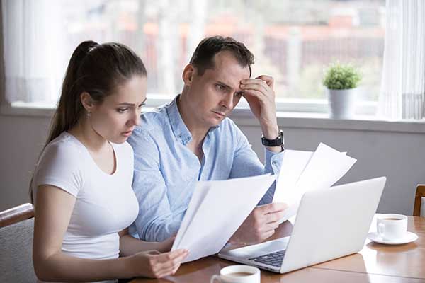 Couple Working Out IRS Spouse Debt Problems
